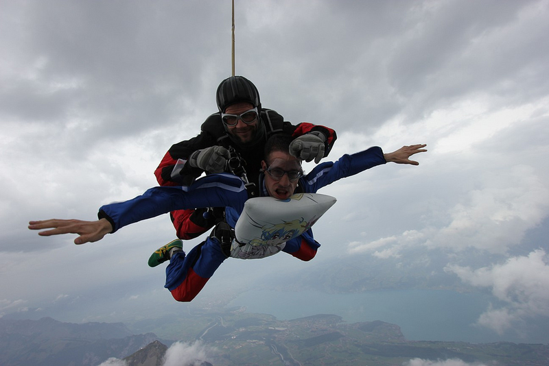 Illustration for article titled Pure Nerd Insanity: Two Men Skydiving with a Girly Hug Pillow